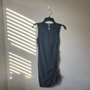 Lululemon size 4 tight fitting dress with a tied ruching on the side